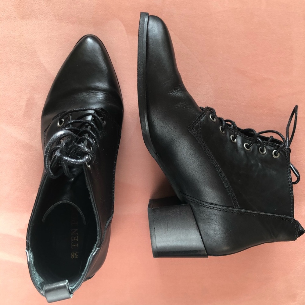 Black leather pointy stack heels